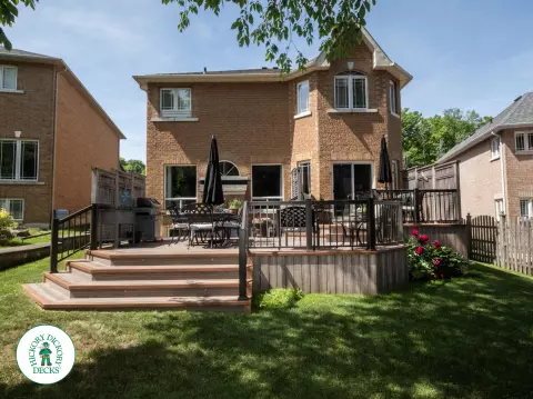 Zuri deck with floor pattern, built in ights and privacy screens in Richmond Hill