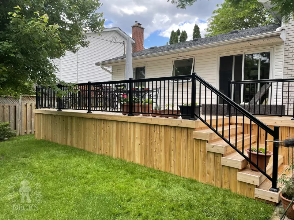315 square foot cedar deck with lighting system in stairs.