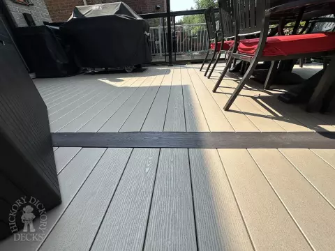Clubhouse high deck with glass rail and spiral staircase in Newmarket