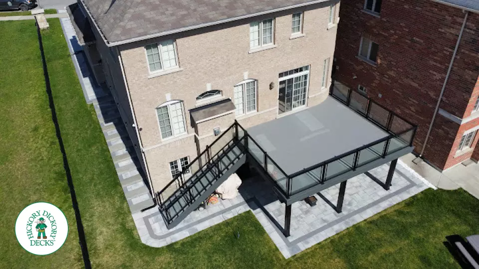 Trex high deck with glass railings in Brampton