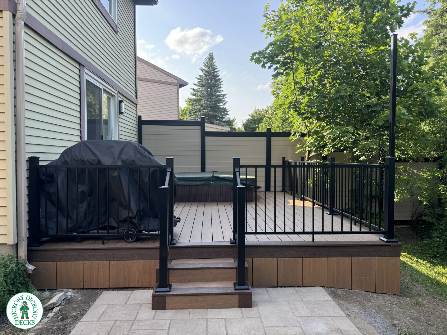 Clubhouse hot tub deck with privacy screens in Ottawa