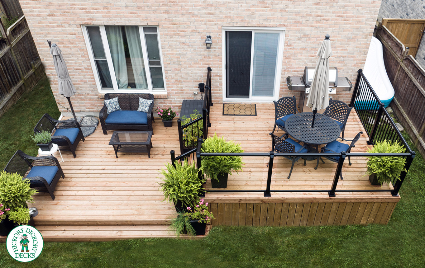 two level cedar deck with aluminum and glass railings