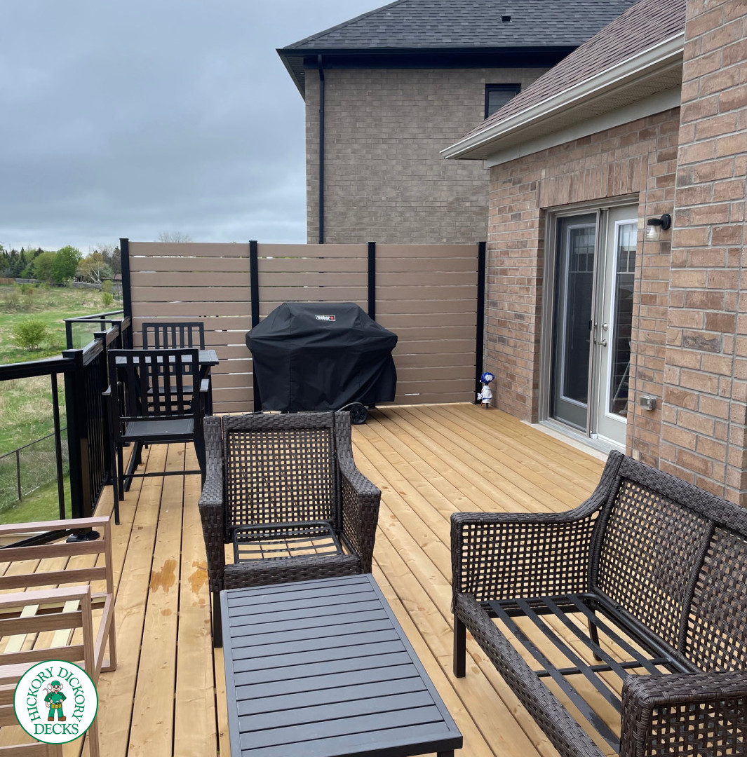 Pressure Treated High Deck with Glass Railings in Bradford