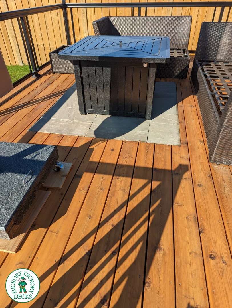 Large cedar deck with stairs, aluminum railing