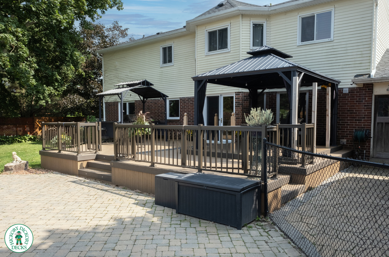Clubhouse deck with aluminum railing with gate insert for access.