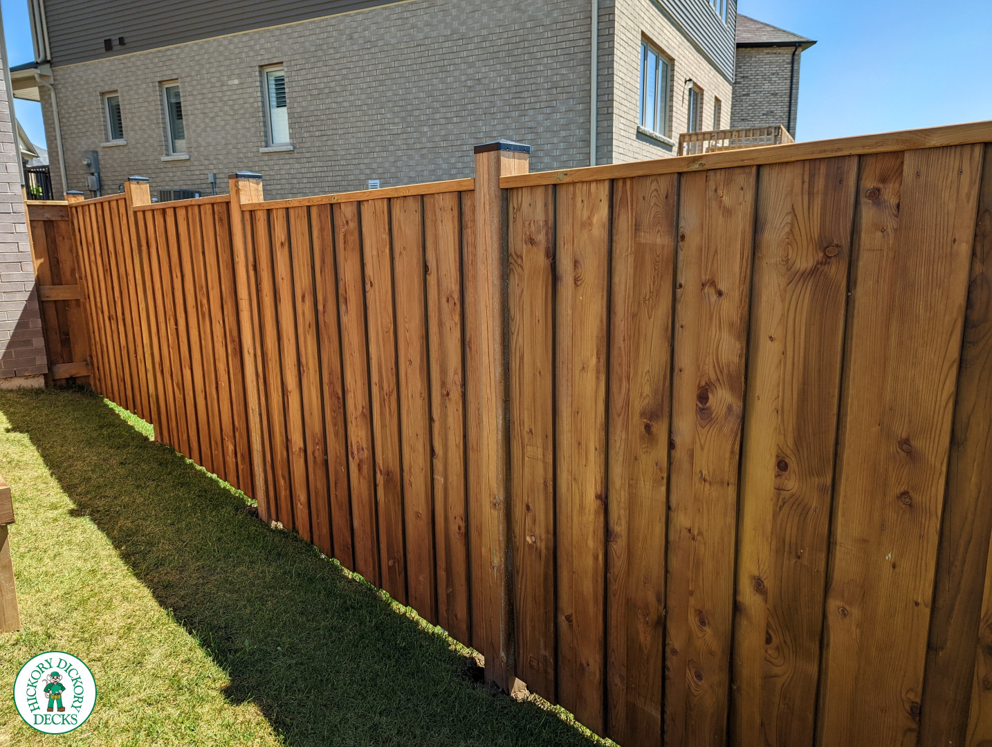 Pressure treated deck with pressure treated privacy screens and fence.