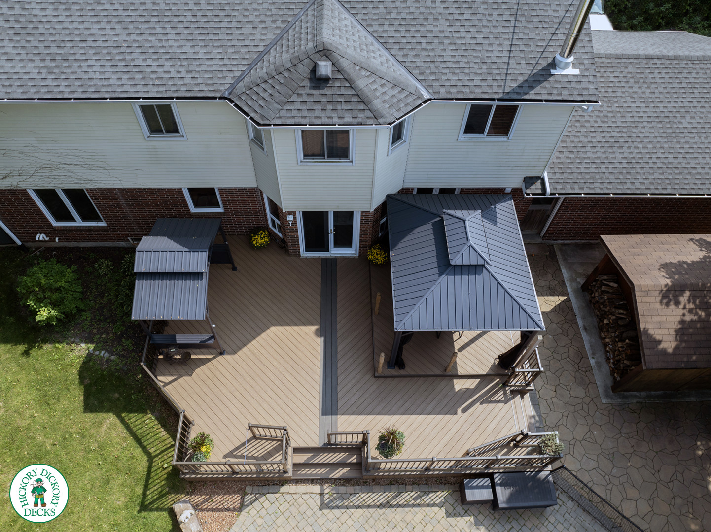 Clubhouse deck with aluminum railing with gate insert for access.