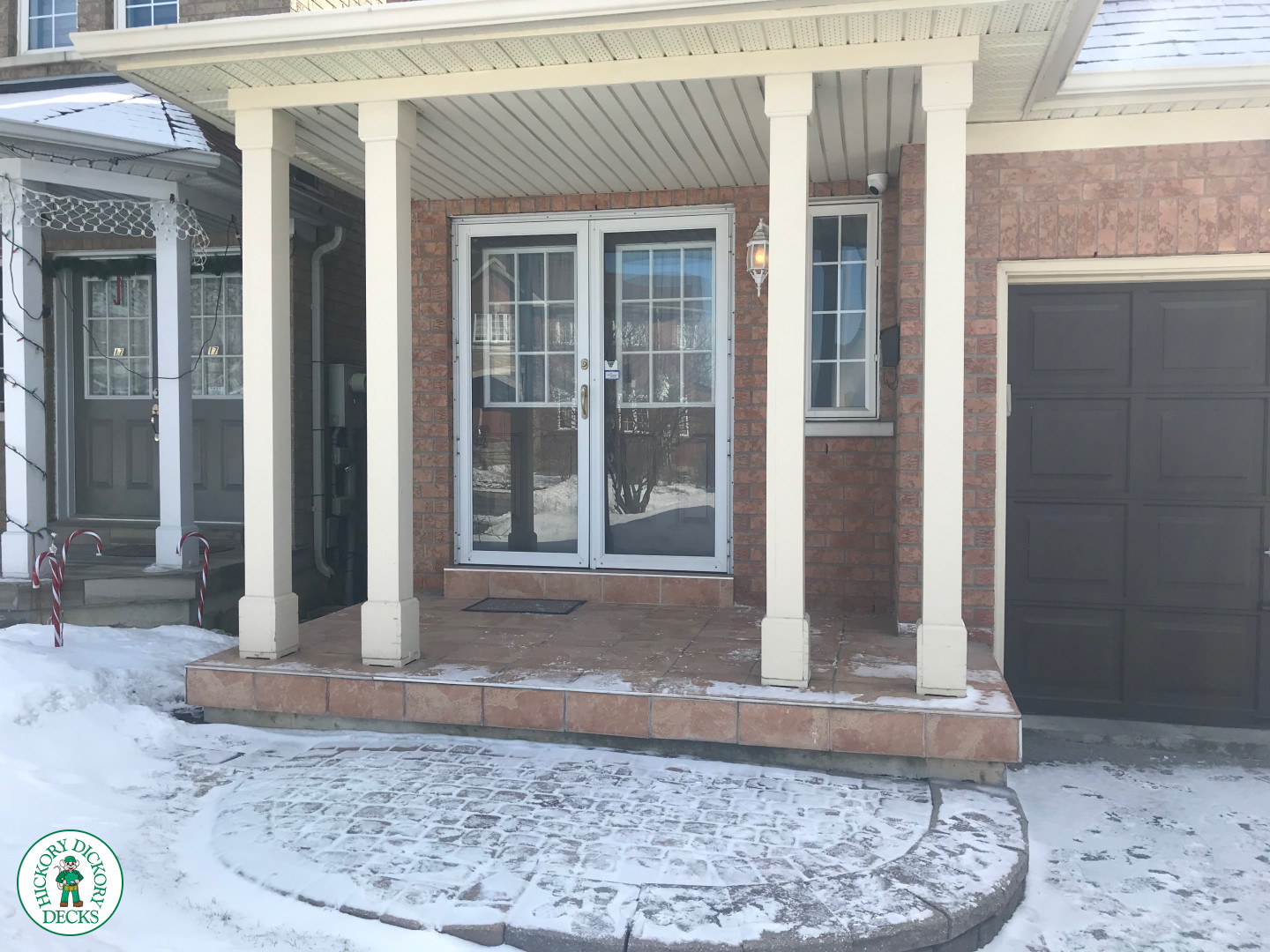 Small light brown front porch  with dark brown trim