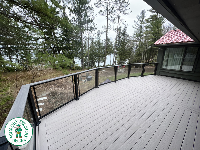 Azek high deck with glass railings in Barrie