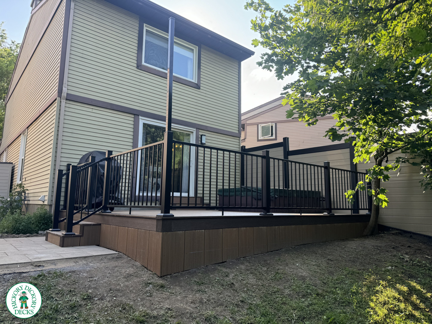 Clubhouse hot tub deck with privacy screens in Ottawa
