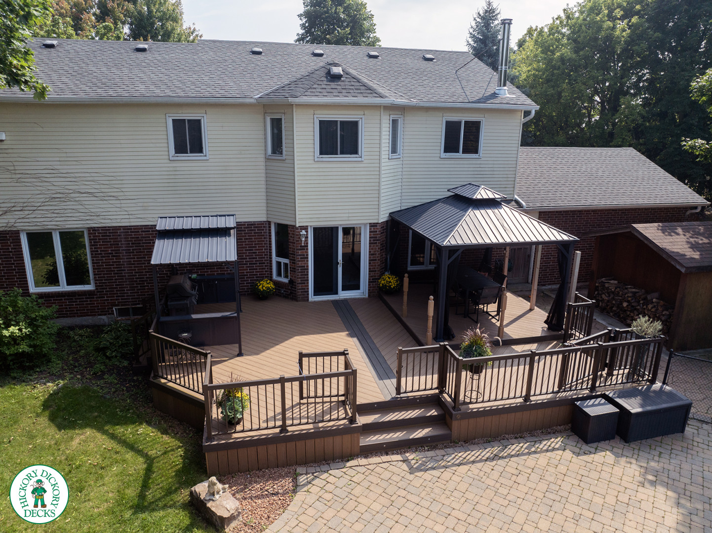 Clubhouse deck with aluminum railing with gate insert for access.