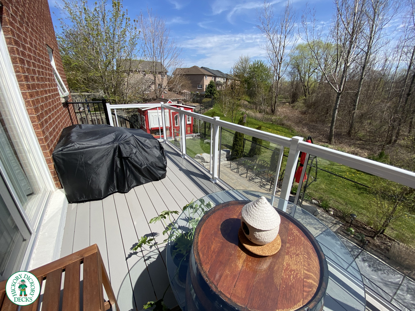 High clubhouse deck with glass railing