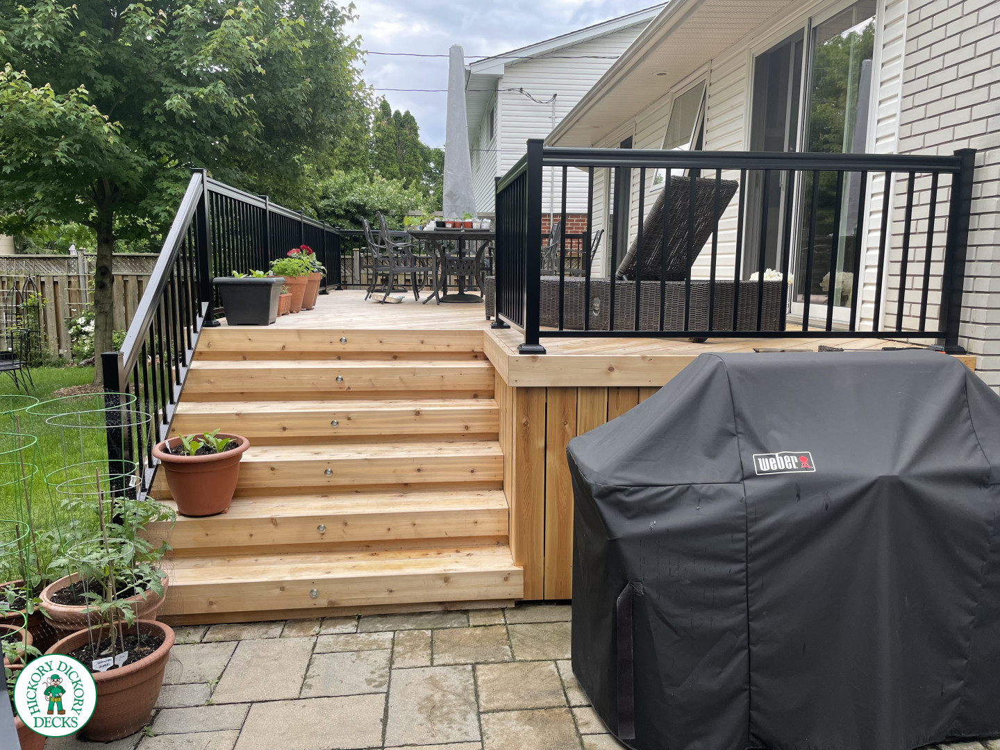 315 square foot cedar deck with lighting system in stairs.