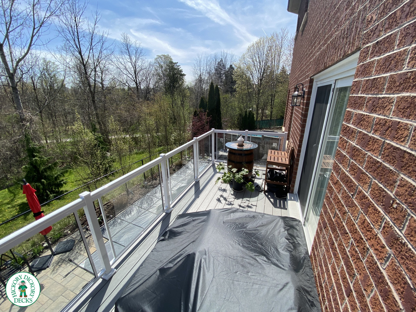 High clubhouse deck with glass railing