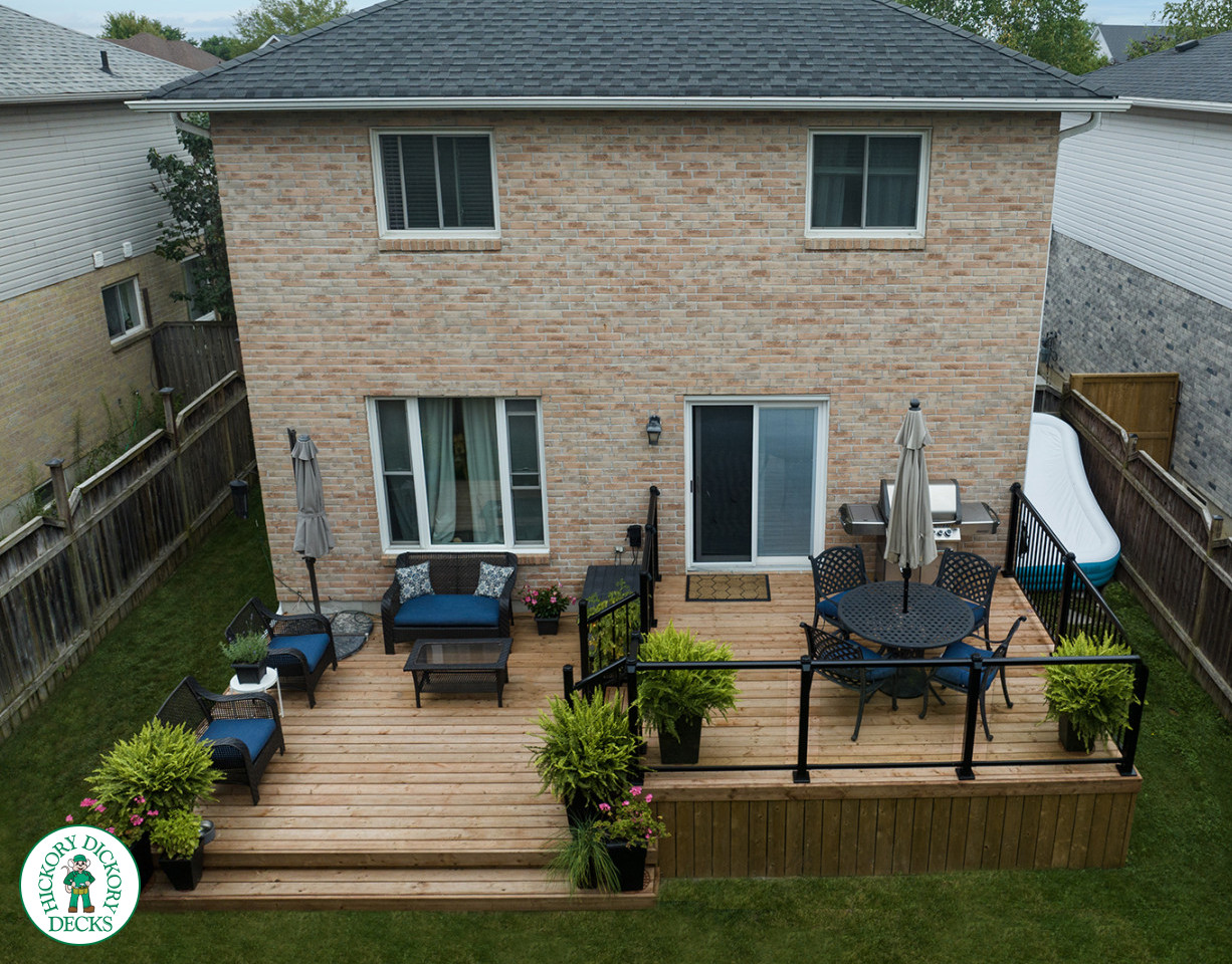 two level cedar deck with aluminum and glass railings
