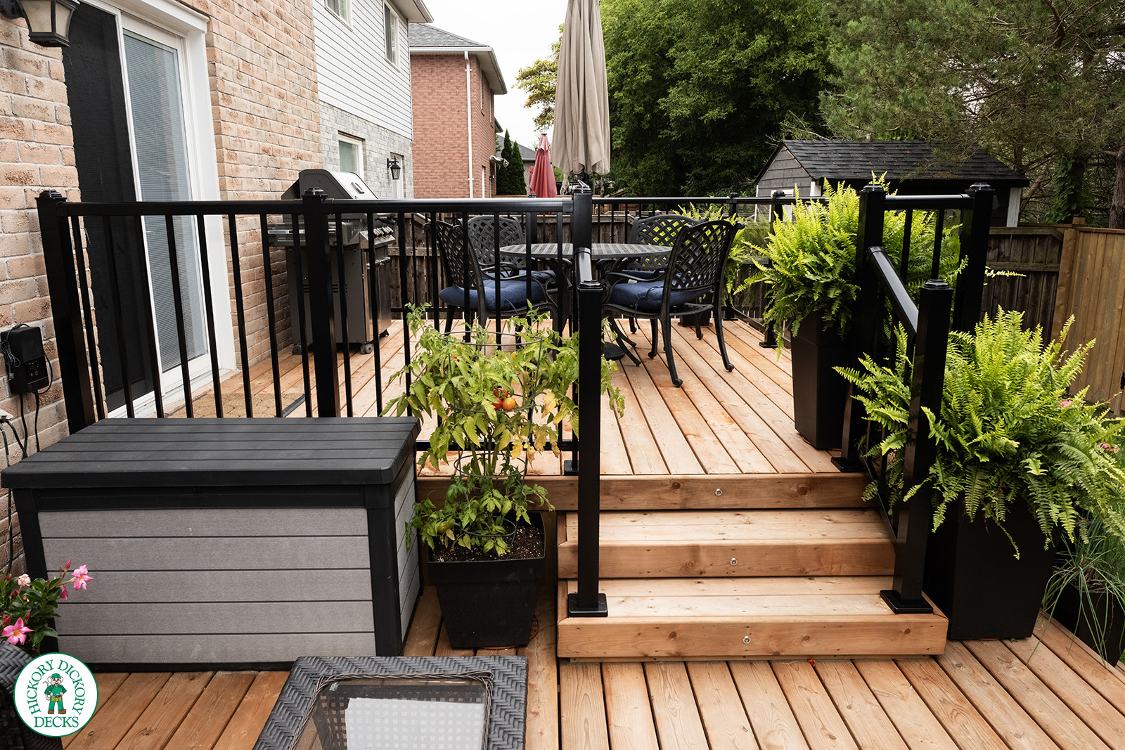 two level cedar deck with aluminum and glass railings